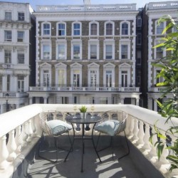 balcony with table and chairs, The Executive Apartments, Kensington, London W8