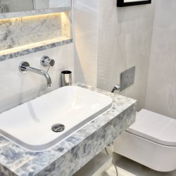 modern bathroom with sink, WC, heated towel rail, St Johns Apartments, St Johns Wood, London NW8