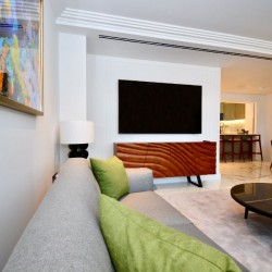 large sofa, side table, smart TV, round table, dining area and kitchen, St Johns Apartments, St Johns Wood, London NW8
