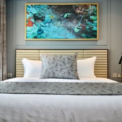 king size bed and artwork with fish, St Johns Apartments, St Johns Wood, London NW8