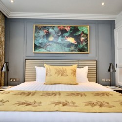 king sifze bed, wardrobes and art work with sea motive, St Johns Apartments, St Johns Wood, London NW8