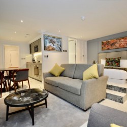 studio with dining area, sofa, bed and kitchen, St Johns Apartments, St Johns Wood, London NW8