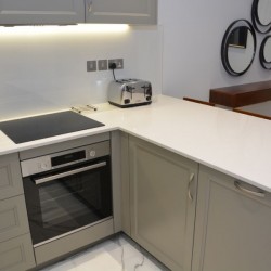 kitchen for self catering and small mirrors on wall, St Johns Apartments, St Johns Wood, London NW8
