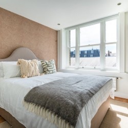 bedroom with large double bed and mirror, King Street Deluxe, Covent Garden, London WC2