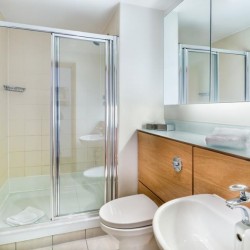 bathroom with shower cubicle, toilet, sink, King's Apartments, City, London EC4