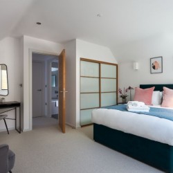 main bedroom with wardrobe, The Mews Homes, Hammersmith, London W6