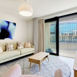 living room with sofa, table and large door to balcony, Wembley Apartments, Wembley, London HA9