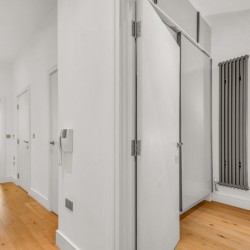 hallway to living area and view into bedroom, Carlow Apartments, Camden, London NW1