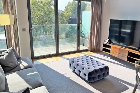 living room with TV, stool and view to balcony, Chancery Lane Apartments, Holborn, London W1C