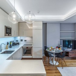 kitchen, dining table with breakfast and TV,Chancery Lane Apartments, Holborn, London W1C