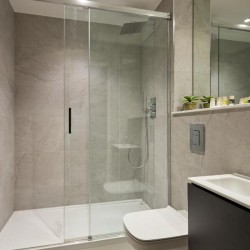 bathroom with shower, toilet, sink and mirror, Holborn Apartments, Holborn, London WC2