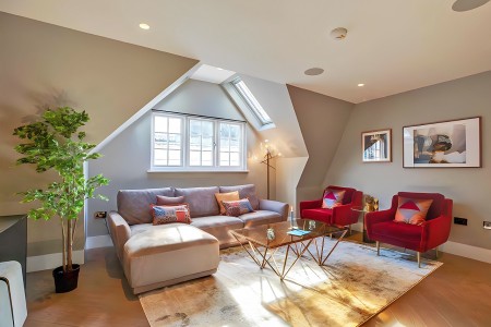 living room with corner sofa, chairs, coffee table and large plant, Soho Deluxe Apartments, Soho, London W1D