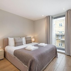 bedroom with double bed, side tables with lamps, Southbank Apartments, Southwark, London SE1