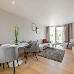 living room with dining area, sofa, chair, coffee table and TV, Southbank Apartments, Southwark, London SE1