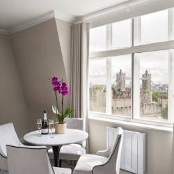 dining area with flowers and wine on table, view to tower bridge, The Executive Residences, Tower Hill, London EC3