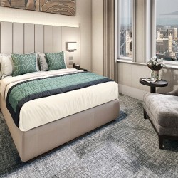 double bedroom with side tables, lamps, chair and view to tower bridge, The Executive Residences, Tower Hill, London EC3