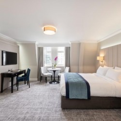 room with double bed, work desk, dining table and chairs, The Executive Residences, Tower Hill, London EC3