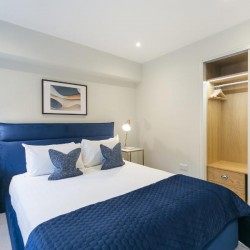 double bedroom with lamps on side tables and wardrobe, Covent Garden 1, Covent Garden, London WC2