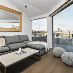living room with sofa, table, mirror and large terrace, West End Apartments, Holborn, London W1C