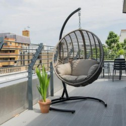 terrace with plant and round hanging chair, West End Apartments, Holborn, London W1C